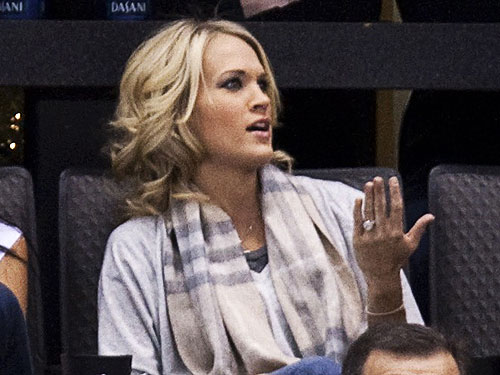 carrie underwood wedding. Carrie Underwood engagement ring at hockey game