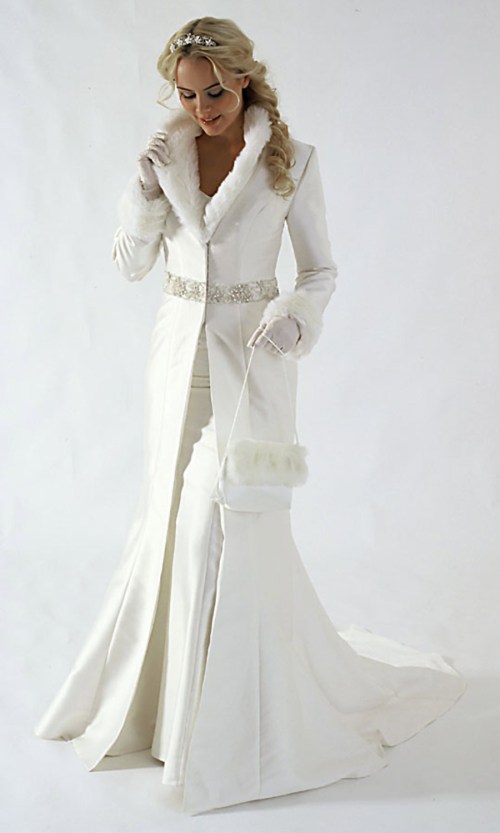 or around a flower centerpiece Winter Wedding Dress via Projectwedding